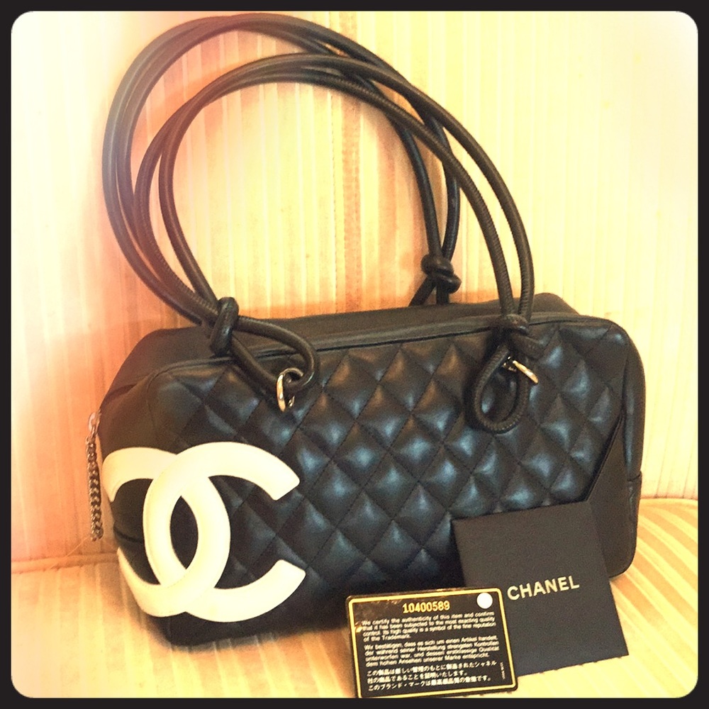 CHANEL Calfskin Quilted Cambon Bowler handbag.